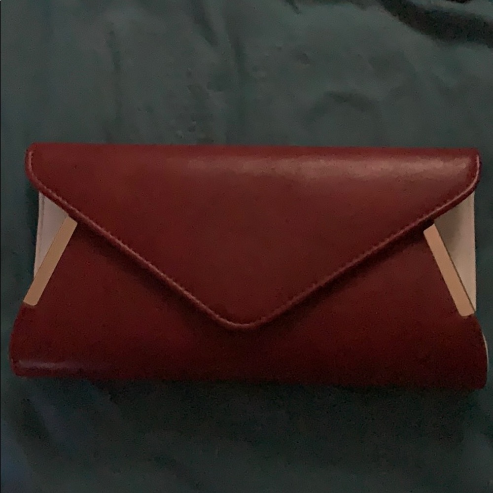 Maroon and white white with gold clutch